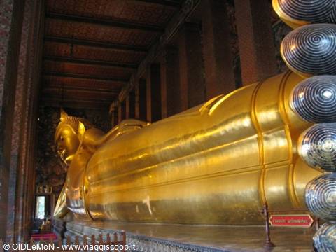 Golden Reclining Buddha statue inside Wat Pho temple, Bangkok