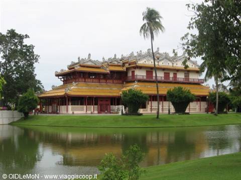 Golden-roofed Thai royal pavilion reflected in the pond at Bang Pa-In