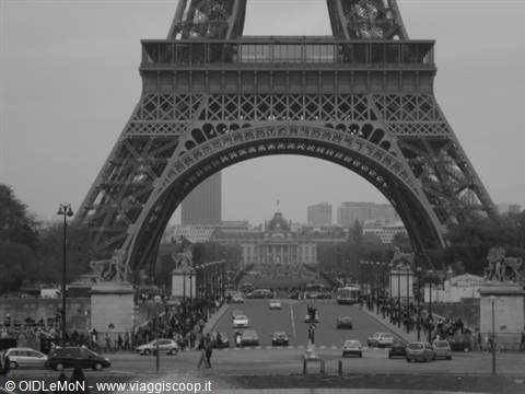 The Eiffel Tower in black and white seen from Pont d'Iéna with traffic