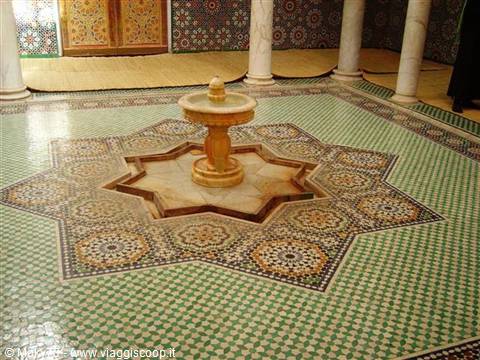 Marble fountain atop zellij mosaic star, Marrakech