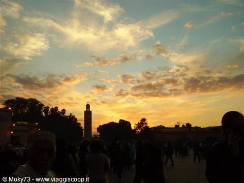 The Koutoubia minaret rises above the crowd at Marrakech's Jamaa el-Fna