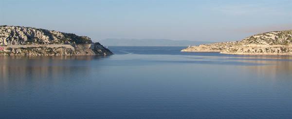 Calm blue water between the limestone Frioul islands, near Marseille