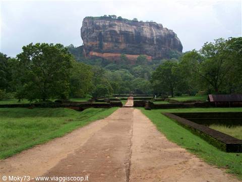 Sigiriya: dirt path through ancient gardens toward the rock