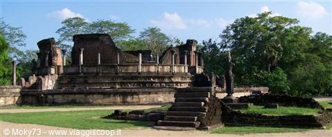 Ancient stone ruins of the Vatadage at Polonnaruwa, staircase and columns among trees