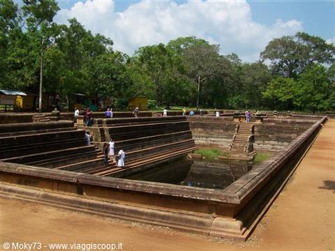 Kuttam Pokuna twin bathing pools in Anuradhapura, stone steps and visitors