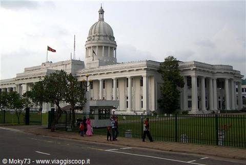 Colombo Town Hall, white domed building, people walking along the street