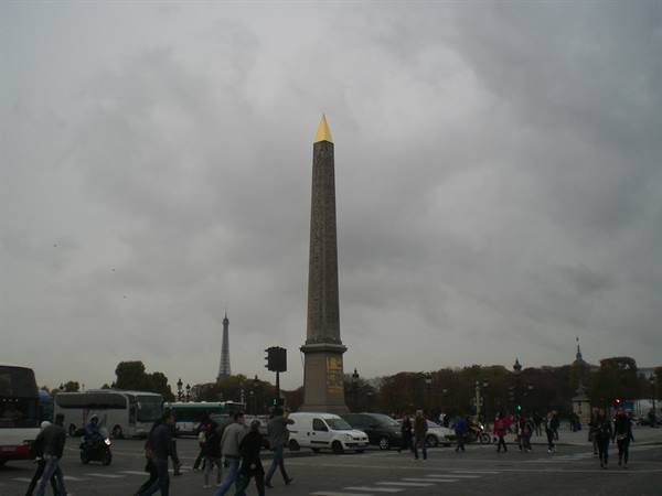 Golden-topped Luxor Obelisk at Place de la Concorde, Eiffel Tower behind