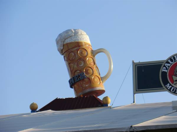 Giant plastic beer mug atop the Paulaner tent roof, Munich