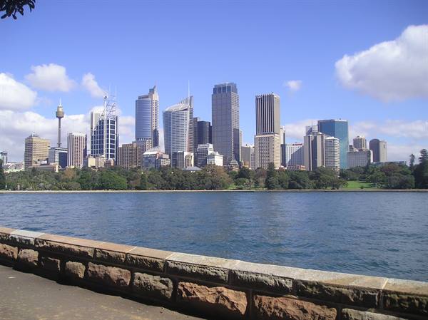 Sydney skyscrapers with Sydney Tower seen from the stone bay wall