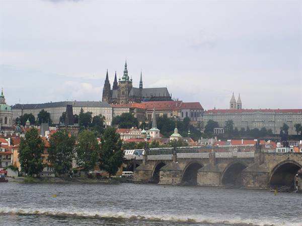 Prague Castle and St. Vitus Cathedral above Charles Bridge on the Vltava