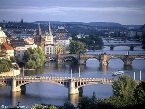 Charles Bridge and the Vltava in Prague among old stone bridges