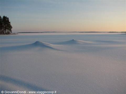 Two 'mounds' of snow on the lake
