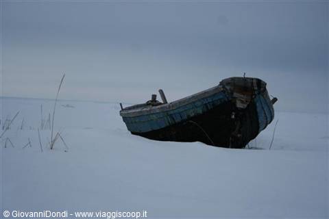 A boat waits for the thaw