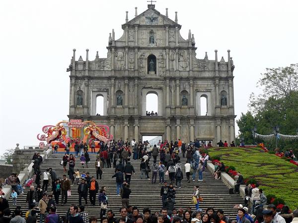 Tourists on the staircase of the Ruins of St. Paul's in Macau