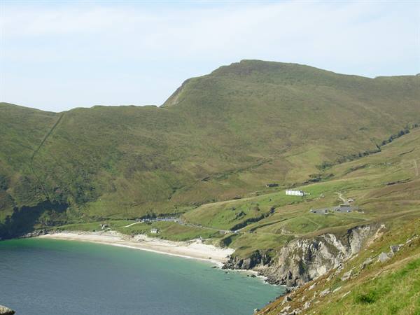 White sand beach and turquoise water beneath green hills, Keem Bay, Achill Island