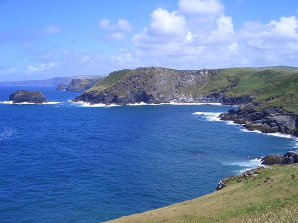 Green cliffs over the ocean at Tintagel, Cornwall