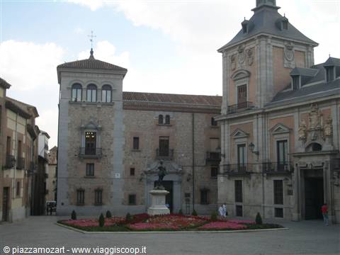 Plaza de la Villa in Madrid, stone and brick façades, flowerbed garden in the center