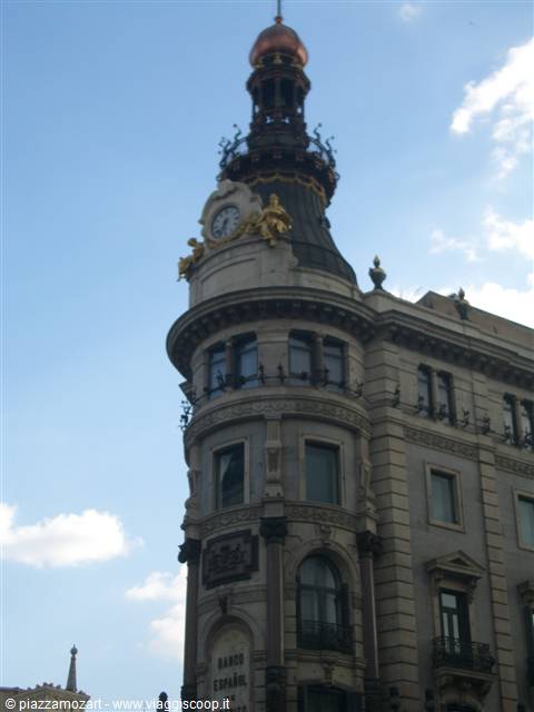 Ornate building with dome and clock, Banco Español, Madrid's Gran Vía