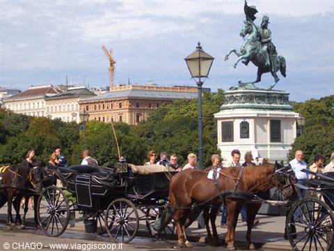 Fiaker horses by the equestrian statue at Vienna's Heldenplatz