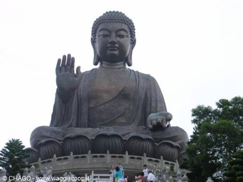Tian Tan Big Buddha bronze statue seated on lotus flowers at Ngong Ping