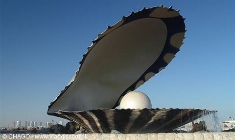 Pearl monument: giant metal oyster shell with white pearl on Doha Corniche