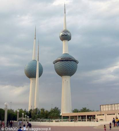 Kuwait Towers: blue tiled spheres rising against a cloudy sky