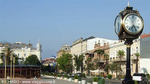 Ornate street clock on iron pole, Europe Square, Batumi