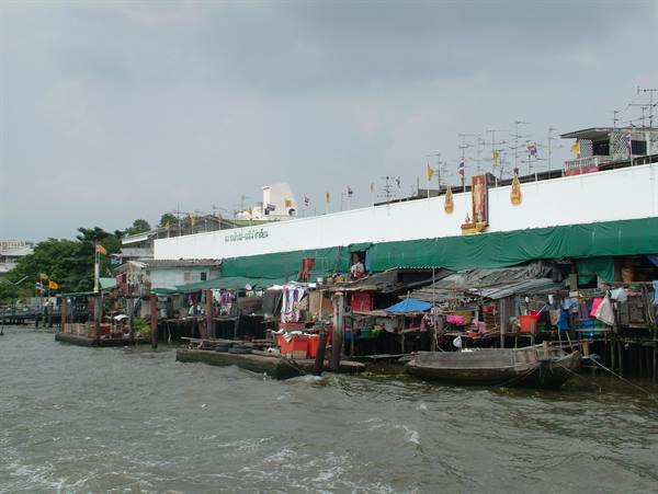 Bangkok life flows along the banks of the Chao Phraya