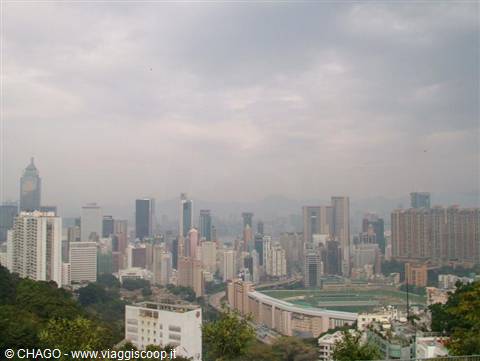 Skyscrapers in haze above Happy Valley racecourse, Hong Kong