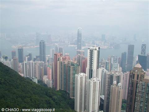 Skyscrapers over Victoria Harbour shrouded in haze, seen from Victoria Peak