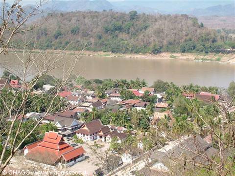 Luang Prabang rooftops and the Mekong River among the trees