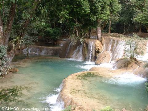 Kuang Si Falls, turquoise travertine pools among tropical trees