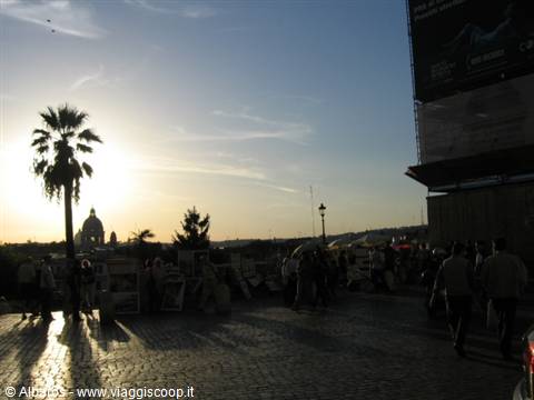 piazza della Trinità full of painters at sunset