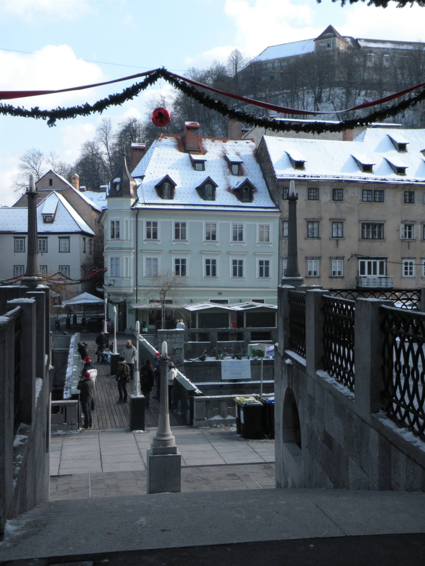 a bridge with a view of the castle