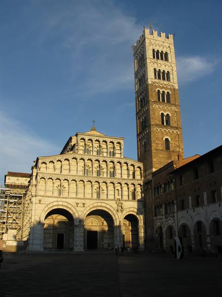Marble Romanesque facade and bell tower of San Martino cathedral in Lucca