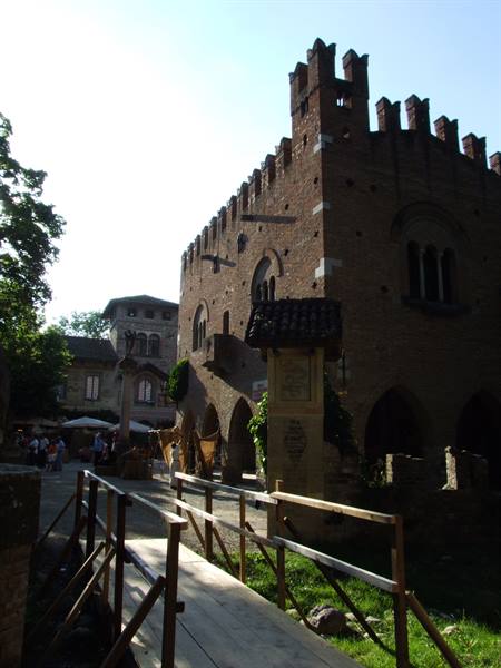 Wooden bridge toward the Borgo Medievale in Turin, brick walls with battlements