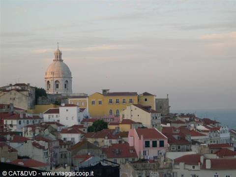 The dome of the National Pantheon rises above Alfama's colorful houses, Lisbon
