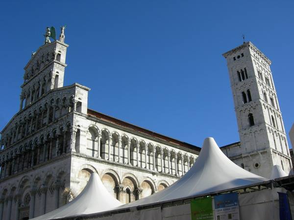 White marble Romanesque facade of San Michele in Foro in Lucca