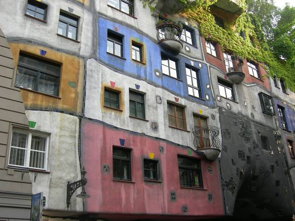 Colorful wavy facade with planted balconies, Hundertwasserhaus in Vienna