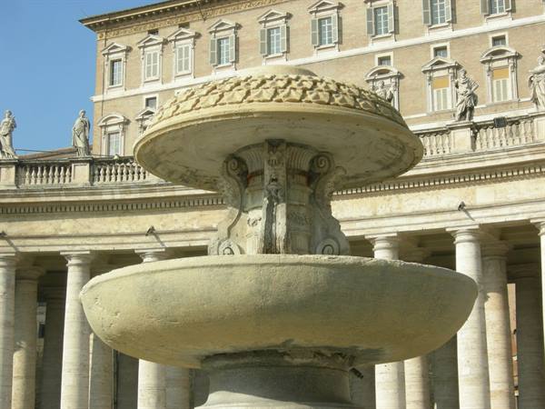 Marble fountain in front of Bernini's colonnade, St. Peter's Square, Vatican