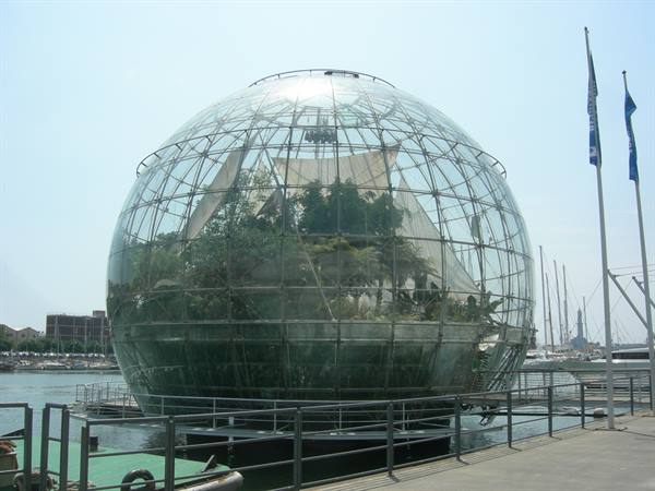 Glass sphere with tropical plants at Genoa harbor