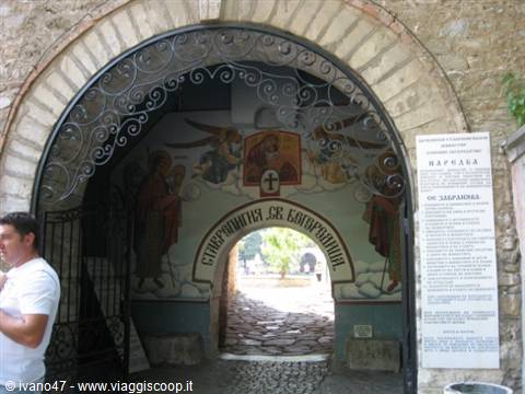 Frescoed entrance gate of Bachkovo Monastery with wrought iron arch
