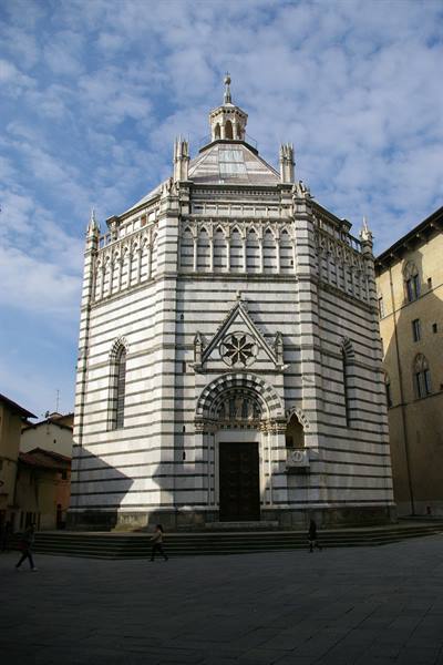 Baptistery of Pistoia, white and green marble, people on the square