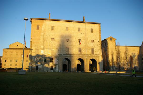 Palazzo Farnese in Piacenza, brick facade lit by late afternoon sun