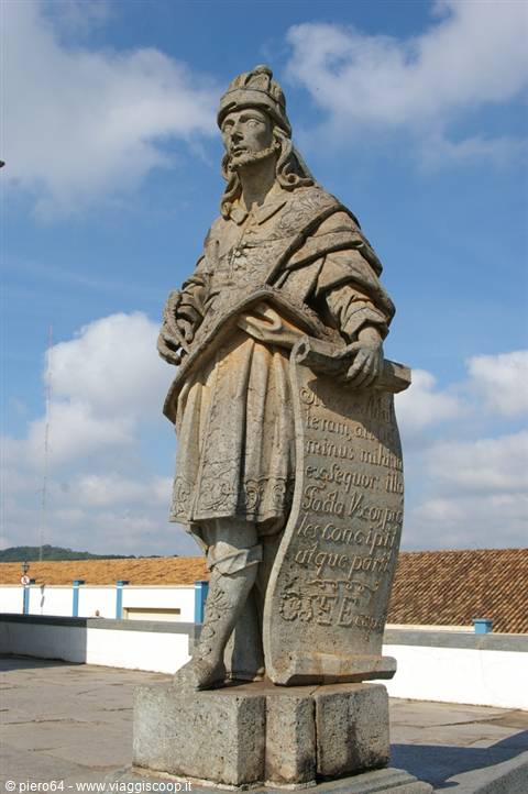 Carved stone prophet statue holding inscribed scroll, Congonhas sanctuary