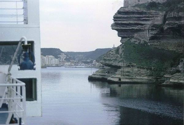 From the ferry, Bonifacio limestone cliffs above the harbor houses