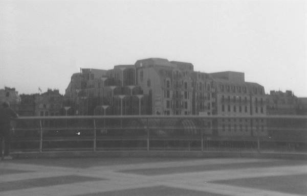 Parisian buildings seen from a bridge over the Seine, black and white photo