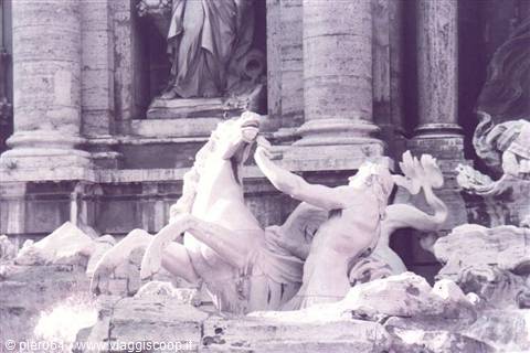Trevi Fountain in Rome, marble sculptures of triton and sea horse
