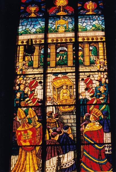 Stained glass window depicting a papal procession in Pavia church