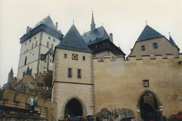 Karlštejn Castle, stone walls and Gothic towers under a grey sky